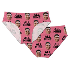 Load image into Gallery viewer, A pair of pink panties with a repeated pattern of a smiling face surrounded by the text 'ALL MINE' in white.